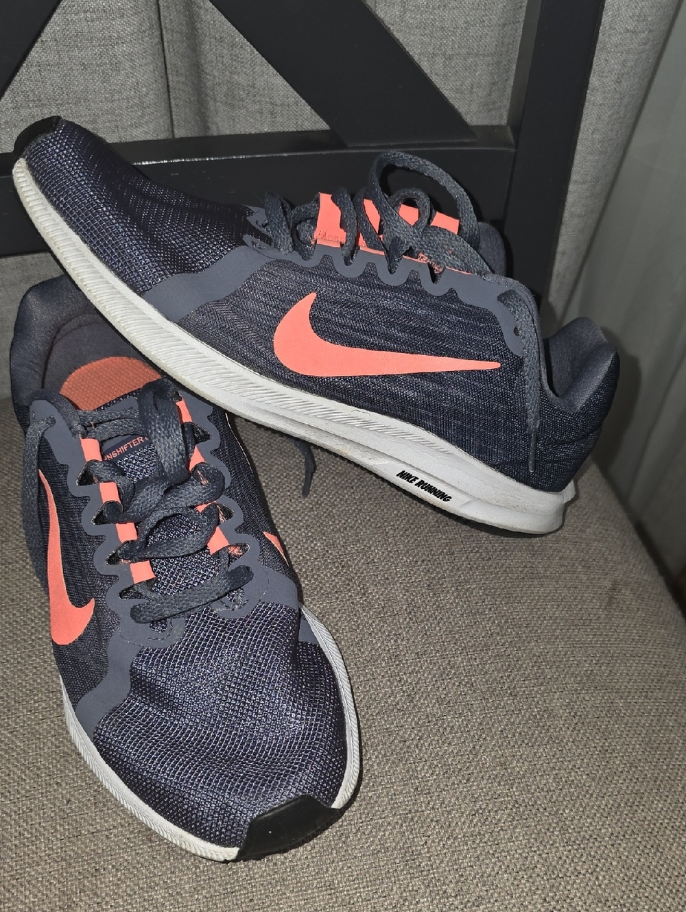 Nike Downshifter 8 running shoes in a grey And Coral Color.